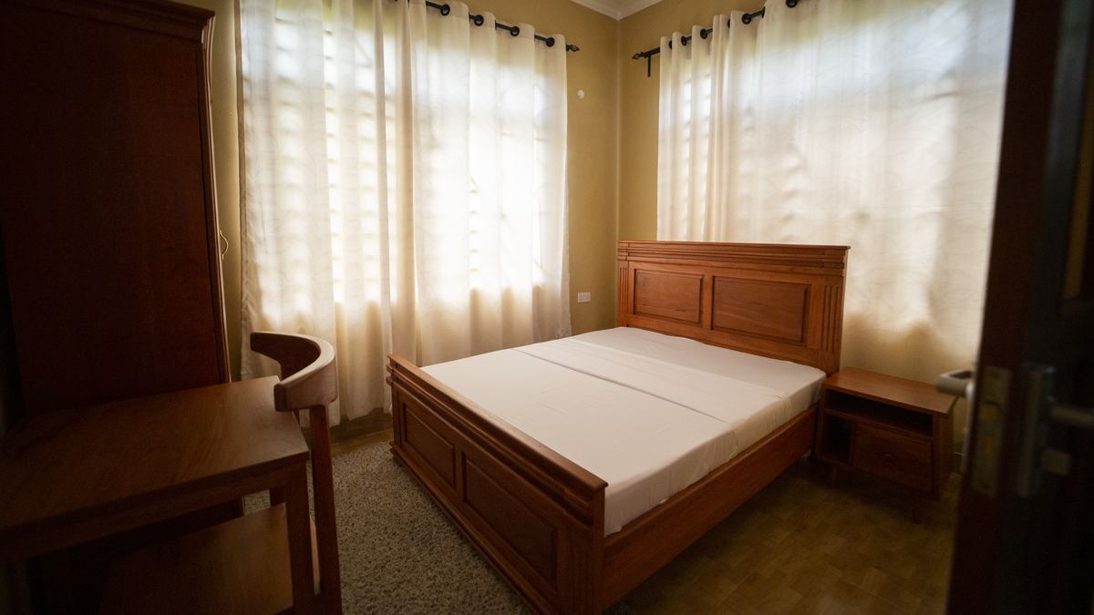 Second bedroom with double bed and wardrobe